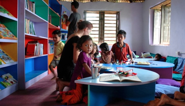 The first children try out the new library at Shree Prabhat in 2010. Today it can be difficult getting in the door, it's so popular!